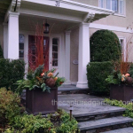 winter-planters-copper-accent-grapevine-balls-pinecones-evergreens